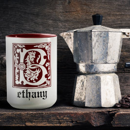 Taza Capital decorativa B de las criaturas míticas del 