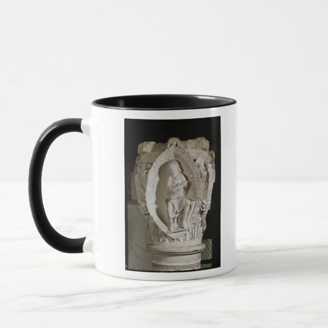 Taza Capital que representa la primera llave de (Izquierda)