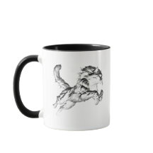 Chat bondissant en noir et blanc.