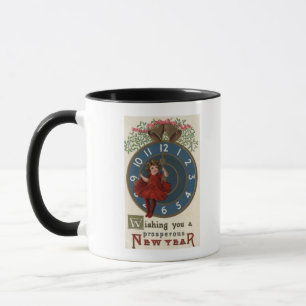 Taza Chica en rojo sentado en el reloj