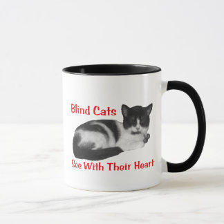 Taza ciega del gato