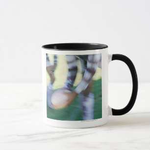 Taza Ciérrese para arriba de un paso del jugador de la