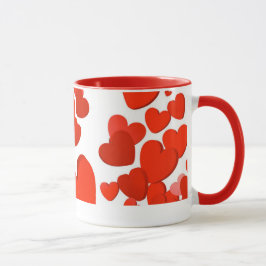 Taza coloreada rojo encantador del corazón