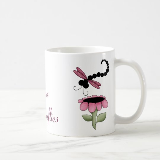 Taza colorida de las libélulas