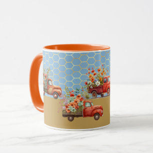 Taza con camiones rojos y flores