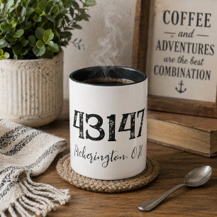 Taza con código postal angustiado