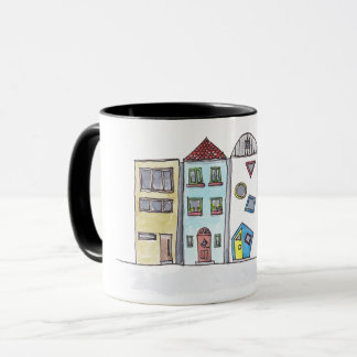 Taza con las casas urbanas