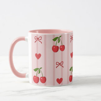 Taza con lazos rojos y cerezas