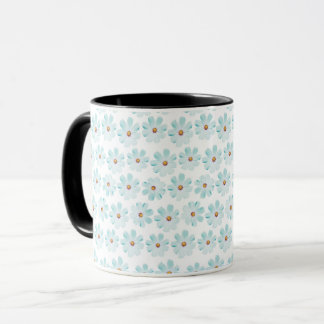 Taza con patrón floral de margarita azul