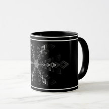 Taza con patrón geométrico blanco y negro