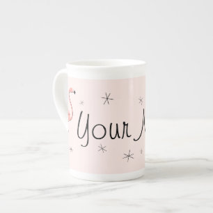 Taza conocida rosada de la porcelana de hueso del