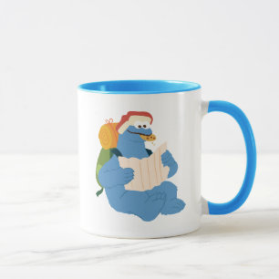 Taza Cookie Monster leyendo un mapa
