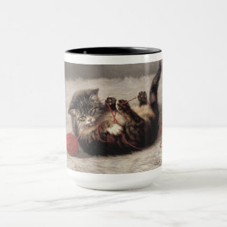 Taza Cuna de gato, un gato jugando con una bola de hilo