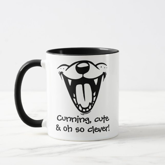 Taza "¡Cunning, lindo y muy inteligente!" (Izquierda)