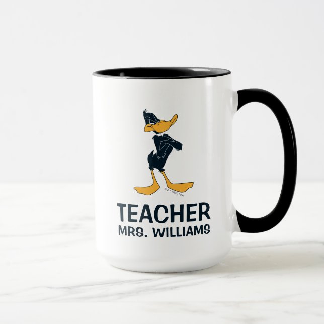 Taza DAFFY DUCK™ con un maestro con brazos cruzados (Derecha)