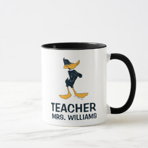 Taza DAFFY DUCK™ con un maestro con brazos cruzados