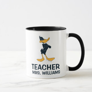 Taza DAFFY DUCK™ con un maestro con brazos cruzados