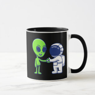Taza de astronauta que conoce a un alienígena