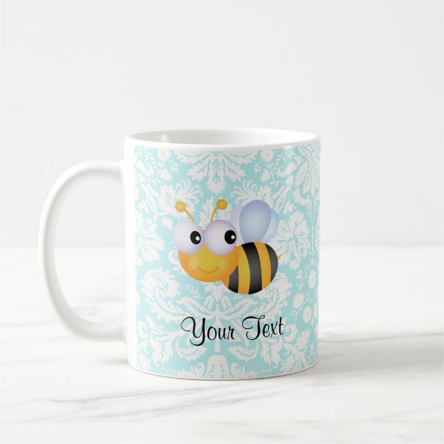 Taza De Café Abeja linda; Modelo verde azulado del damasco (Izquierda)