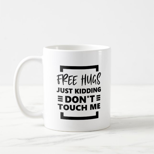 Taza De Café Abrazos gratis solo bromeando No me toques. (Izquierda)