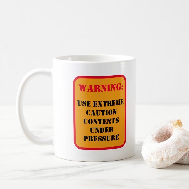 TAZA DE CAFÉ ADVERTENCIA: CONTENIDO BAJO PRESIÓN (Con donut)