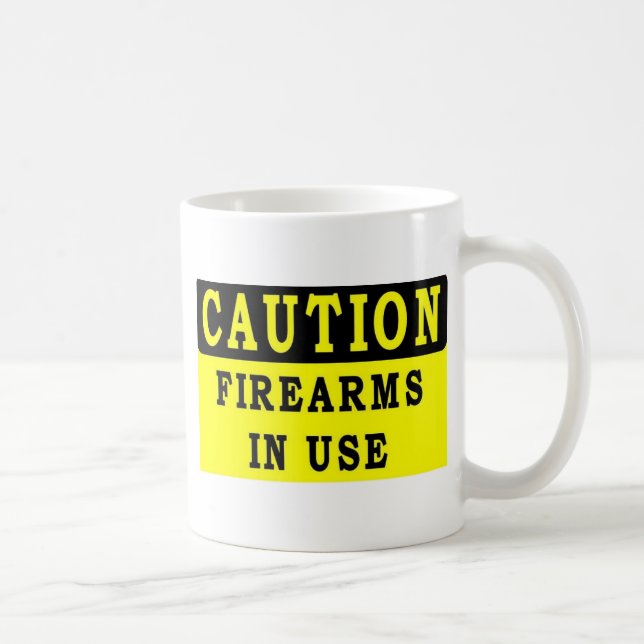 TAZA DE CAFÉ ARMAS DE INCENDIO EN USO (Derecha)