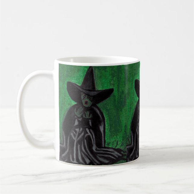 TAZA DE CAFÉ ASISTENTE DE LA BOMBA DE OZ    (Izquierda)