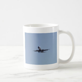 Taza De Café Aterrizando en el sol