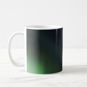 TAZA DE CAFÉ AURORA BOREALIS DURANTE LA NOCHE