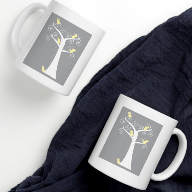 Taza De Café Aves en un fondo gris amarillo árbol (A cute design of yellow birds on a gray background on a mug from Valerie's Gallery on Zazzle.)