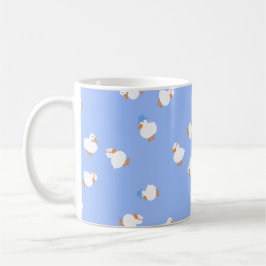 Taza de café azul con patos lindos ilustrados a ma