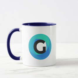 Taza de café azul de los medios de Guido