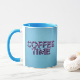 Taza de café azul turquesa con texto morado
