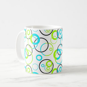 Taza De Café azul verde y negro anillos y círculos sobre blanco