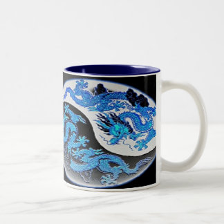 Taza de café azul y anaranjada de los dragones de