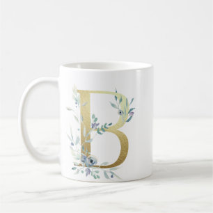 Taza De Café B oro inicial con follaje floral azul