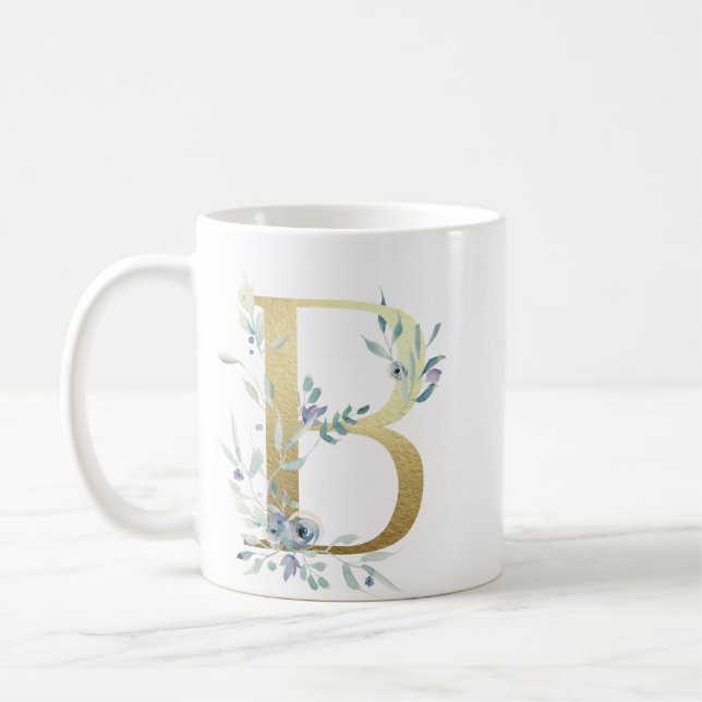 Taza De Café B oro inicial con follaje floral azul (Izquierda)