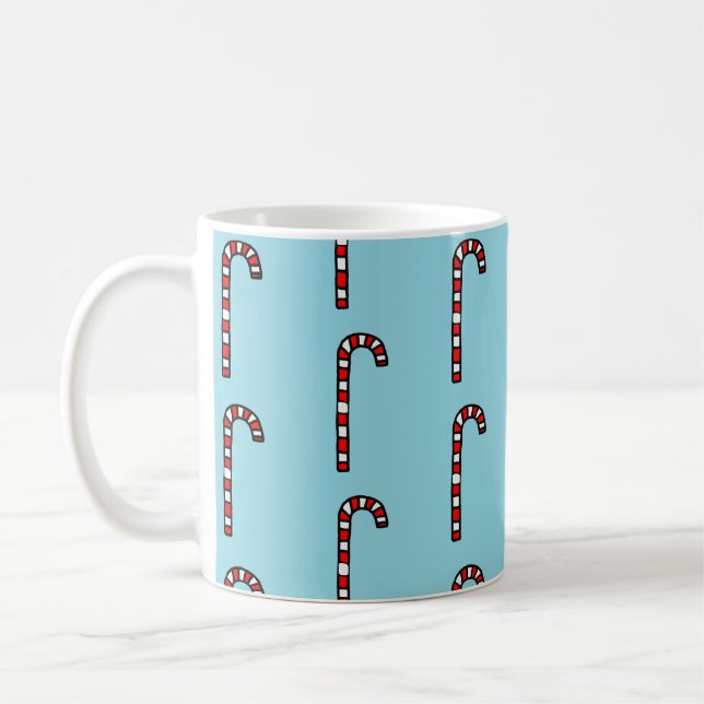 Taza De Café Bastones de Caramelo sobre Fondo Azul (Izquierda)