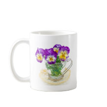 beautiful pansy flowers isolated in a cup