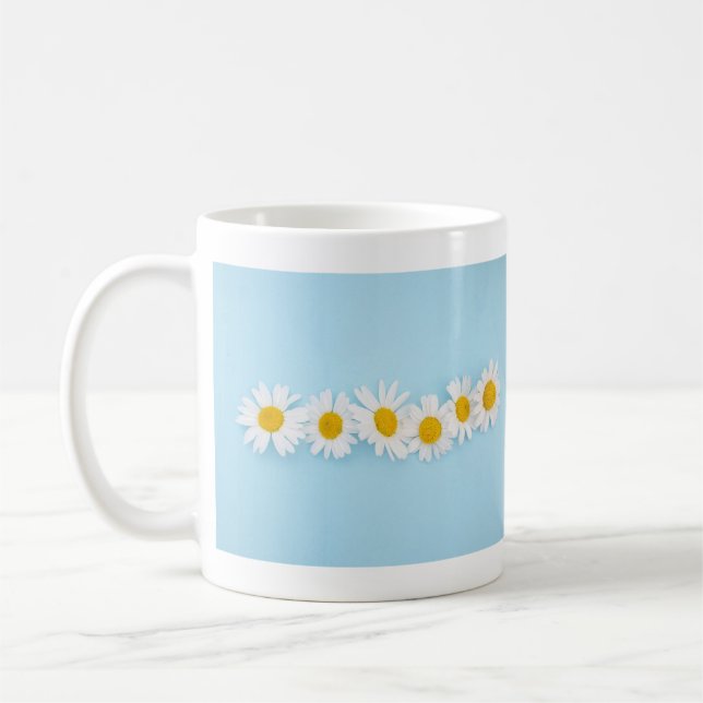 Taza De Café Brillante hilera de margarita en Sky Blue Mug (Izquierda)