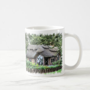 TAZA DE CAFÉ CABAÑAS CUBIERTAS CON PAJA