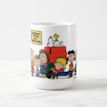 Taza De Café Cacahuetes | La felicidad es ser una pandilla<br><div class="desc">De hecho,  la felicidad es parte de la banda de los cacahuetes,  como se muestra en la querida tira cómica y sus diversas adaptaciones. Los personajes de los cacahuetes,  a pesar de sus defectos y luchas,  encuentran alegría en sus amistades y experiencias compartidas.</div>