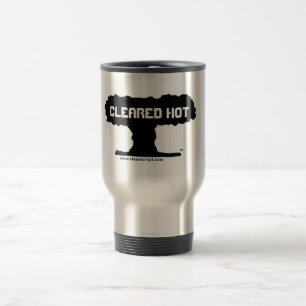 Taza de café caliente despejada del viaje