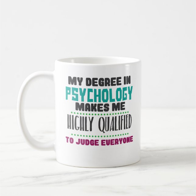Taza de café calificada divertida del PhD PsyD del (Izquierda)