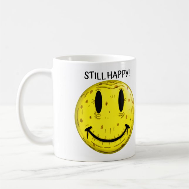 TAZA DE CAFÉ CARA FELIZ VIEJA. VIEJO PERO AÚN FELIZ (Izquierda)
