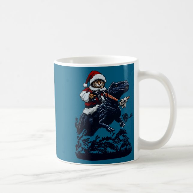 Taza De Café Christmas Cat In Santa Hat Holding A Gun And Dinos (Derecha)