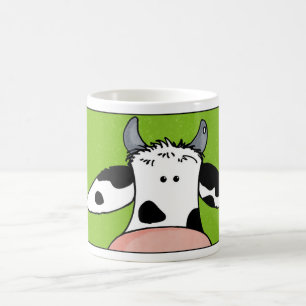 Taza De Café ciérrese encima de vaca
