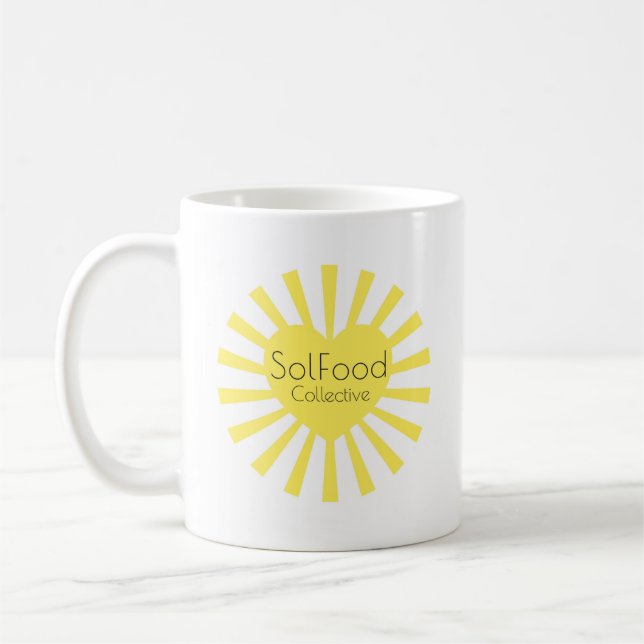 Taza De Café Colectivo SolFood 11oz Mug (Izquierda)