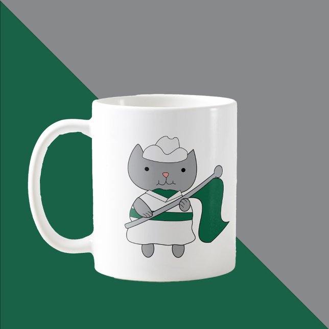 Taza De Café Color Guard Cat Green y White (A mug featuring a gray cat wearing a green and white color guard uniform.)