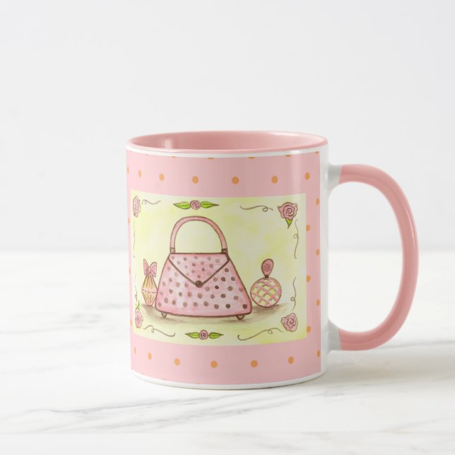 Taza de café con botella de perfume de bolso rosa (Derecha)